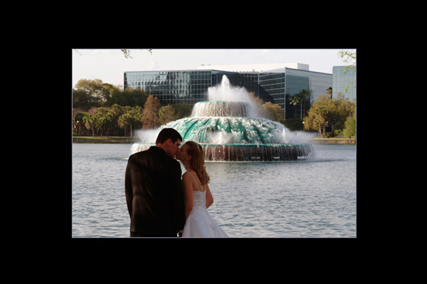 bride and groom at lake eola